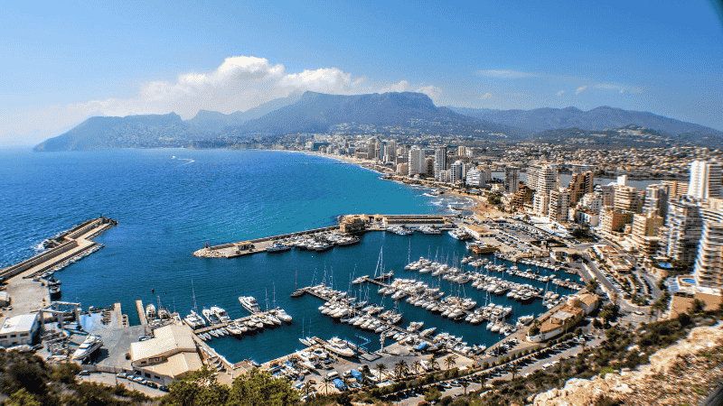 An aerial view of Alicante in the sun, representing one of the best places for British expats to live in Spain.