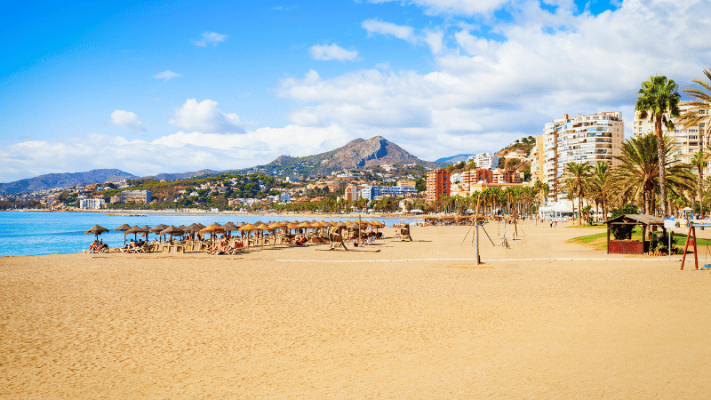 Quiet beach in Malaga on a clear day.